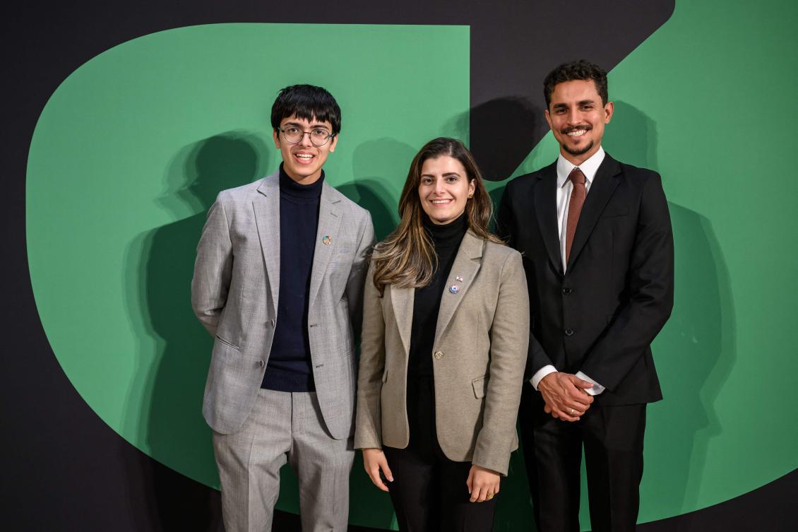 (From L) Young activists India’s Dev Karan, Lebanon’s Marina El Khawand and Brazil’s Salvino Oliveira pose on the eve of the Young Activists Summit award ceremony at the UN in Geneva, on Nov. 19, 2025. (AFP)