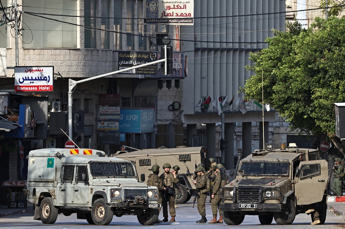 Singapore imposes sanctions, entry bans on four Israeli West Bank settlers. (AFP)