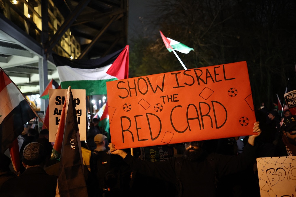 Above, pro-Palestinian protesters demonstrate outside Villa Park in Birmingham on Nov. 6, 2025 ahead of the UEFA Europa League league-stage football match between Aston Villa and Maccabi Tel Aviv. (AFP)