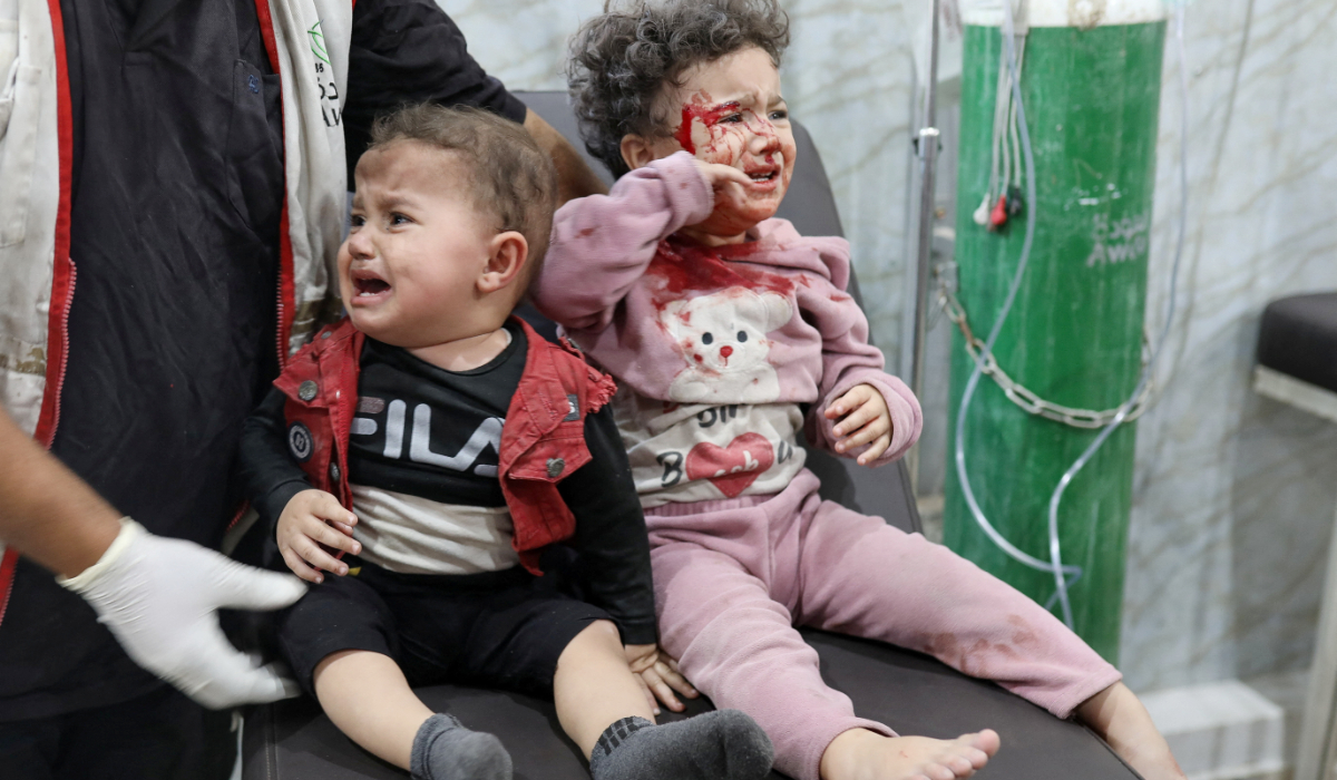 Palestinian children receive medical attention at Al-Awda Hospital, following an Israeli air strike, according to medics, in Gaza City November 22, 2025. (REUTERS)