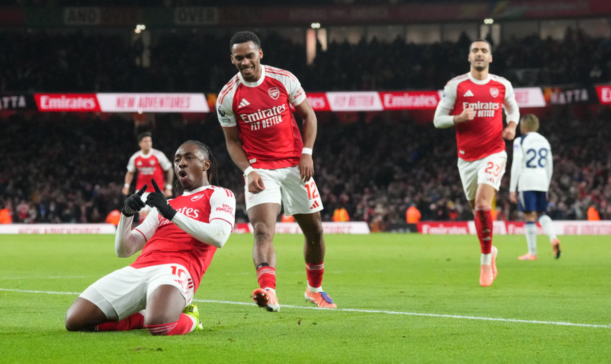 Arsenal's Eberechi Eze celebrates after scoring during a Premier League soccer match between Arsenal and Tottenham in London, Sunday, Nov. 23, 2025. (AP)