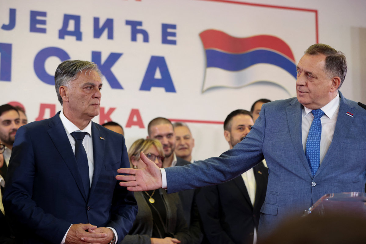Milorad Dodik, former president of the Bosnian Serb Republic, and Sinisa Karan attend a press conference after preliminary results indicated Karan won a snap presidential election in Banja Luka, Bosnia and Herzegovina, November 23, 2025. REUTERS/Amel Emric