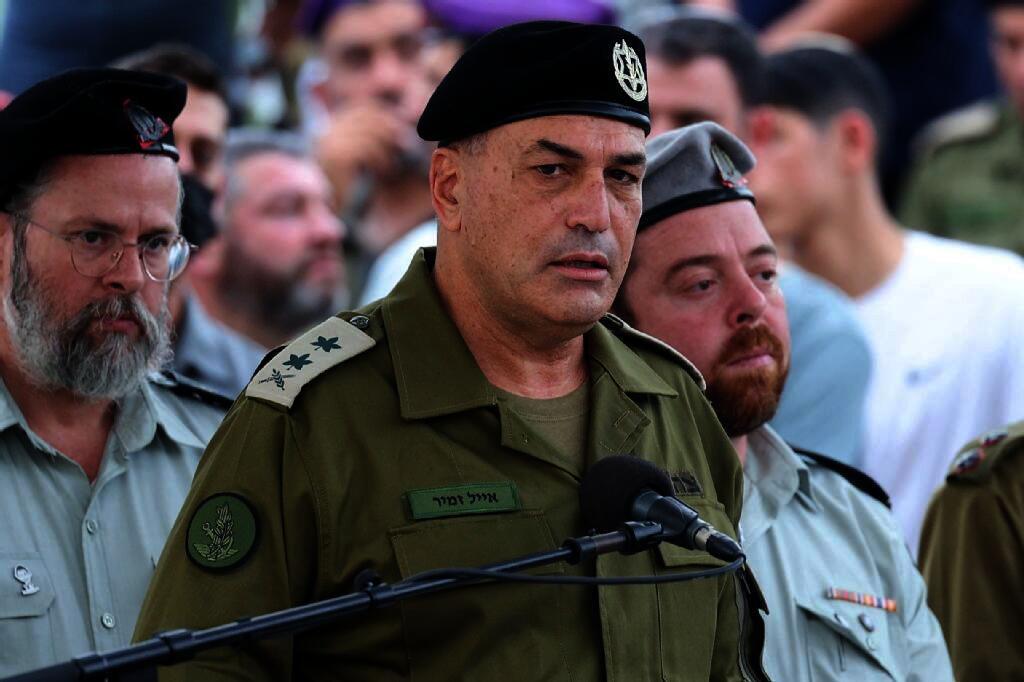 Israel's military chief Lieutenant General Eyal Zamir speaks during the funeral of Lieutenant Hadar Goldin. (AFP)
