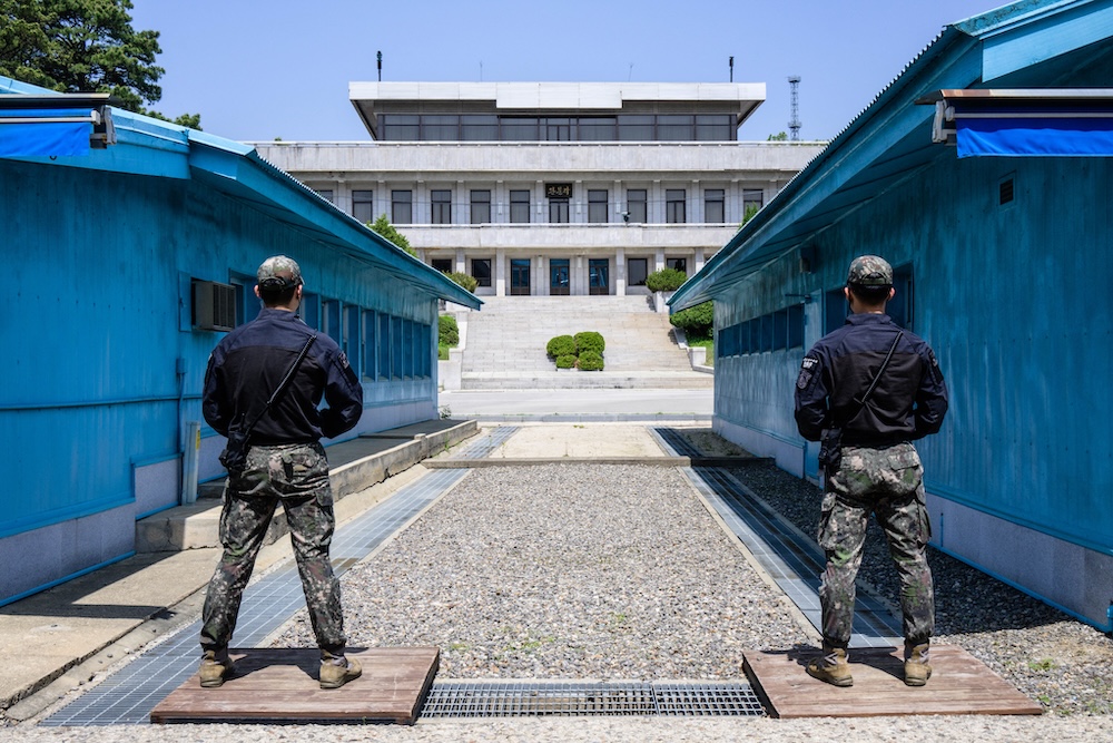 South Korean soldiers stand guard as they face North Korea’s Panmon Hall at the truce village of Panmunjom in the Joint Security Area of the Demilitarized Zone separating North and South Korea. (AFP)