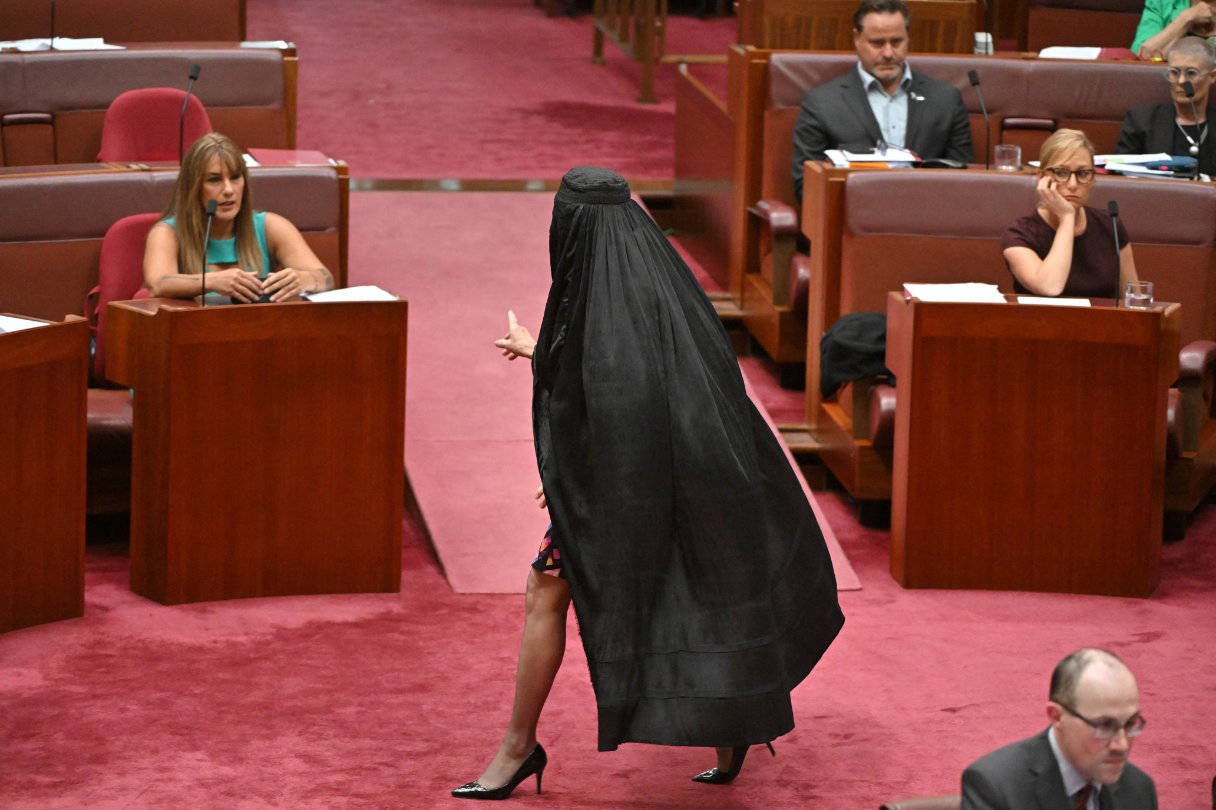 One Nation leader Pauline Hanson wears a burqa in the Senate chamber at Parliament House in Canberra, Australia, November 24, 2025. (Reuters)