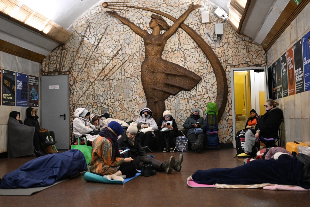 People take shelter at a metro station during an air attack in Kyiv amid the Russian invasion of Ukraine, Nov. 25, 2025. (AFP)