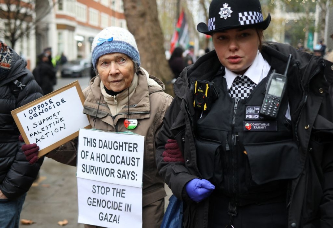 Police remove a protester for taking part in a demonstration in support Palestine Action" outside Britain's Home Office in London, UK. (AFP)
