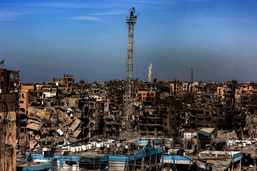 A destroyed building that was a clinic for the UNRWA at the Jabalia camp for Palestinian refugees in the northern Gaza Strip on January 19, 2025 after a ceasefire deal in the war between Israel and Hamas was implemented. (AFP)