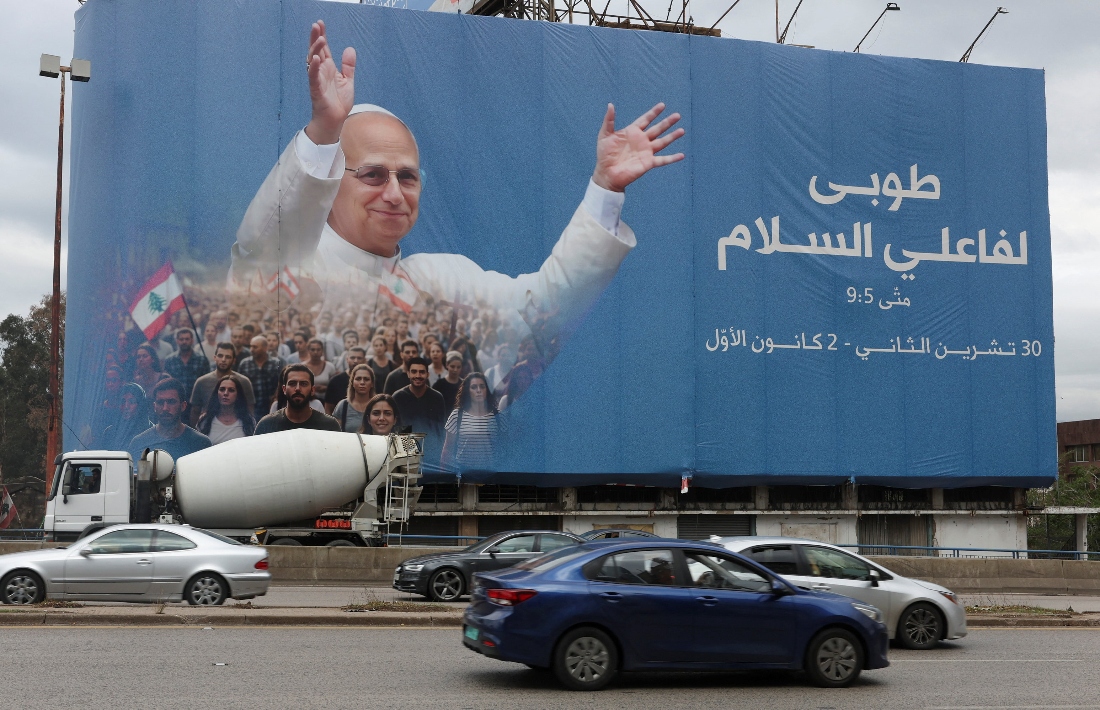 Cars drive past a billboard depicting Pope Leo XIV, ahead of his planned visit to Lebanon, in Beirut, Lebanon. (Reuters)