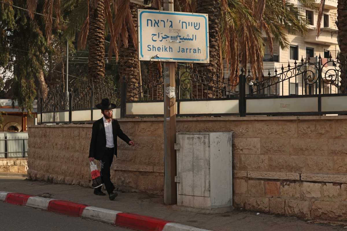 An Ultra-Orthodox Jewish man walks in the Sheikh Jarrah neighbourhood of Israeli-annexed east Jerusalem, Nov. 17, 2025. (AFP)
