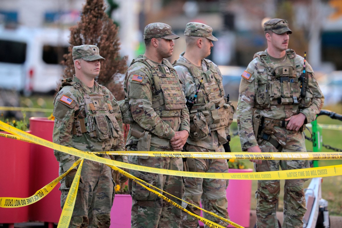 National Guard soldiers respond to a shooting near the White House in Washington, DC. (AFP)