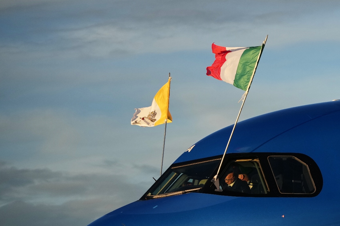 The Vatican and Italian flags wave on the airplane taking Pope Leo XIV to a six-day trip to Turkiye and Lebanon as it prepares for takeoff in Rome's Fiumicino airport. (AP)