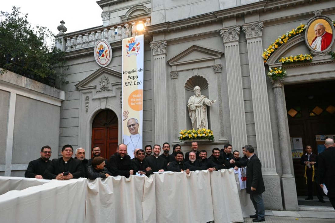 Clergymen wait for Pope Leo XIV outside the Cathedral of the Holy Spirit (St Esprit cathedral) in Istanbul, Turkiye. (AFP)