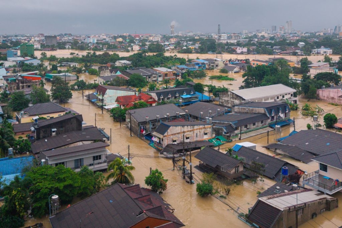 Aeral photo shows flood waters surrounding residential buildings in Hat Yai in Thailand's southern Songkhla province. (AFP)