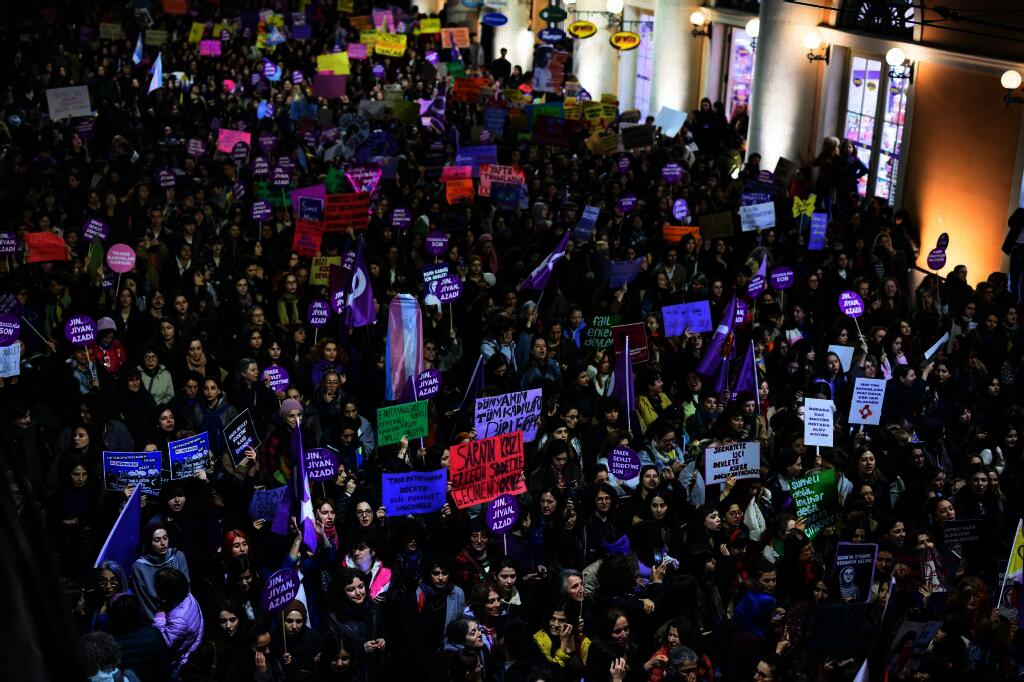 Protesters take part in a participate in a demonstration on International Day for the Elimination of Violence against Women, in Istanbul, on November 25, 2025. (Photo by Yasin AKGUL / AFP)