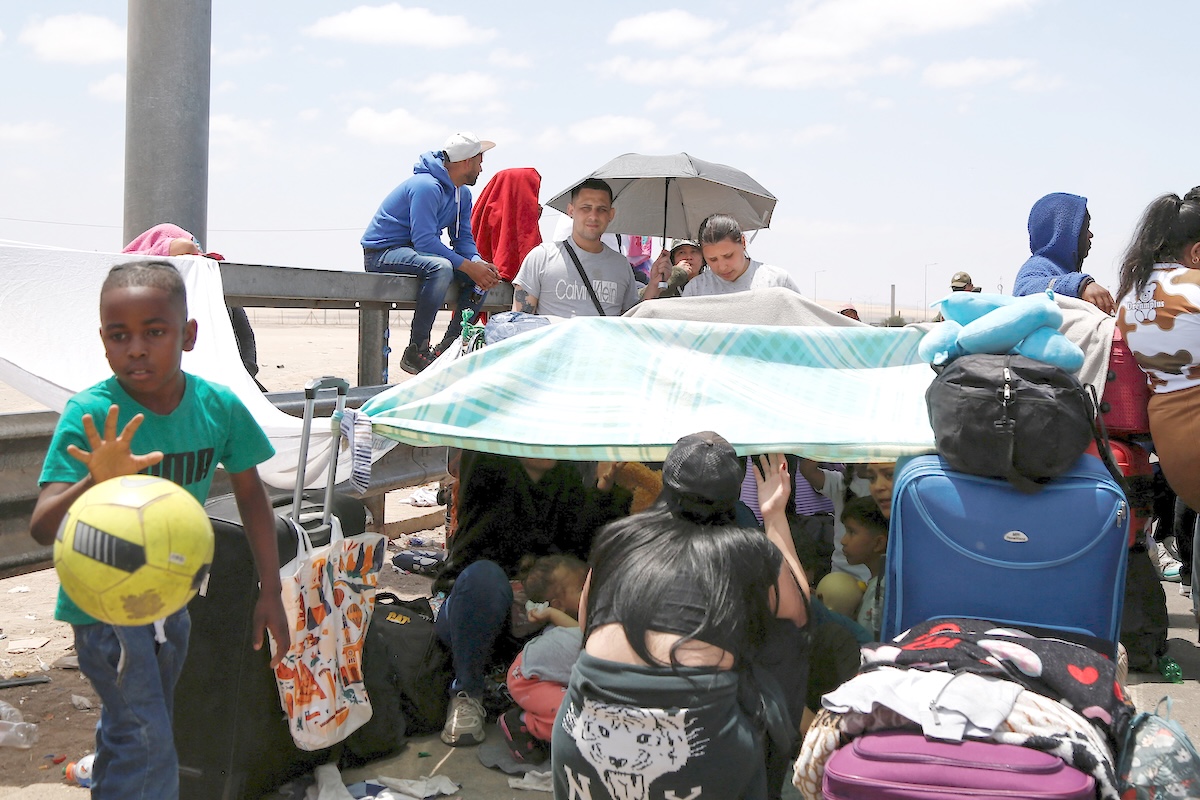 Venezuelan migrants seeking to leave Chile rest as they return to Arica from the Chacalluta Border Complex after failing to cross into Peru on Nov. 28, 2025. (Reuters)