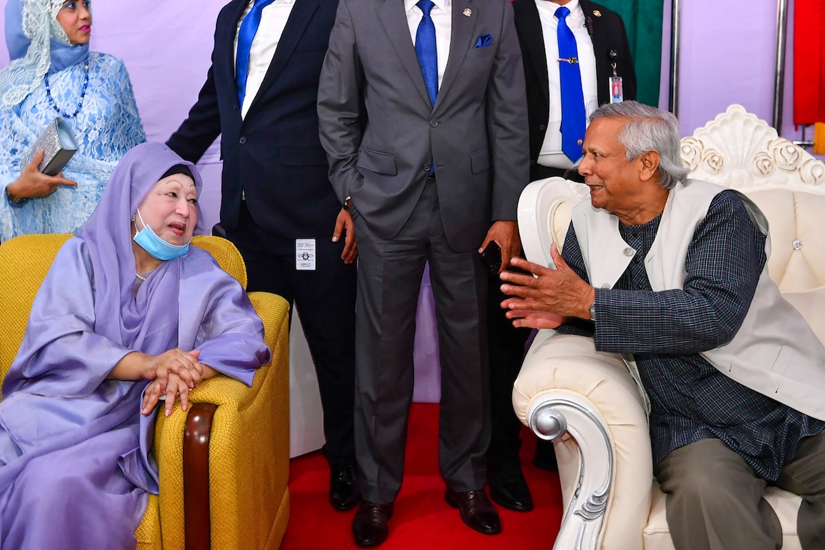 Above, former Bangladesh prime minister Khaleda Zia with Chief Adviser Muhammad Yunus on Nov. 21, 2024. (Press Wing of Bangladesh’s Chief Adviser/AFP)
