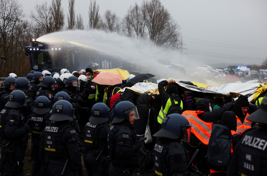 Members of the police use water cannon during a protest organized by the Widersetzen (Resist) alliance to block the founding of a new youth organization of Germany's far-right Alternative for Germany party, in Giessen, Germany. (Reuters)