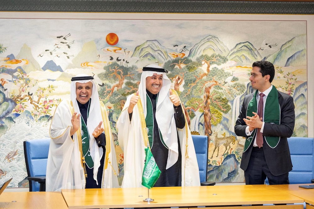 Saudi Minister of Transport and Logistic Services Saleh Al-Jasser, center, celebrates Saudi Arabia’s election to the International Maritime Organization Council for the 2026–2027 term. (SPA)