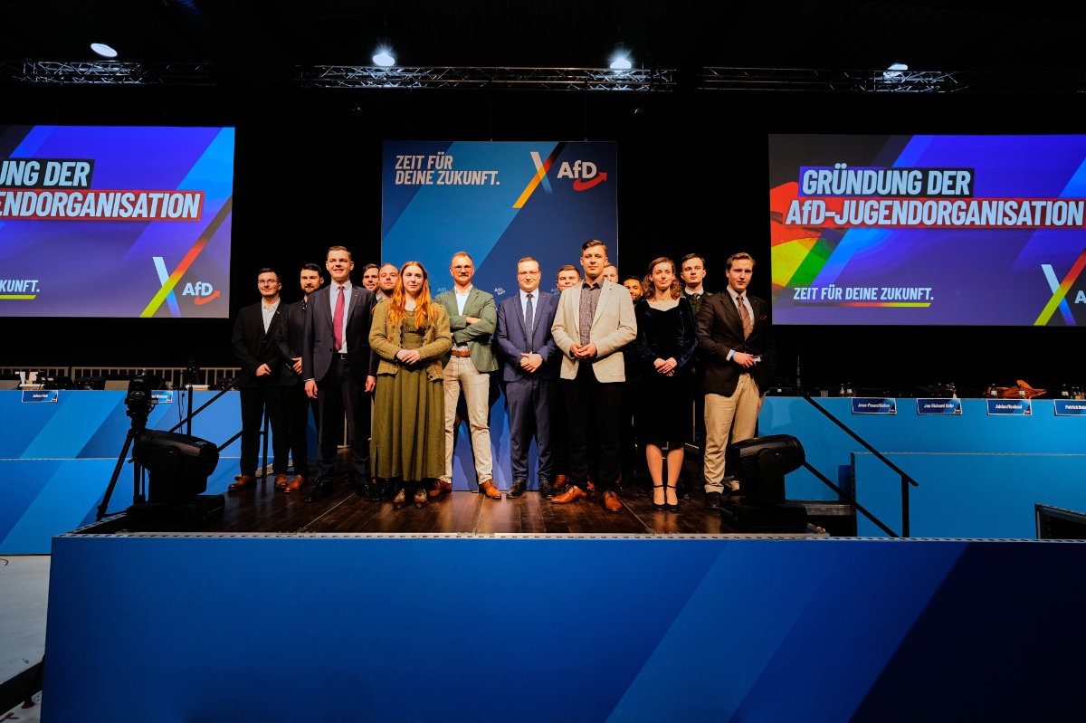 The party board of the AfD youth after the re-founding of the AfD youth organization in Giessen, Germany, early Saturday, Nov. 29, 2025. (AP Photo/Martin Meissner)