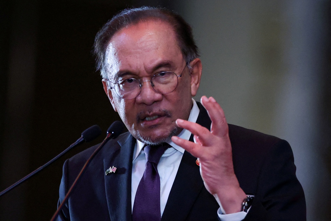 Malaysia's Prime Minister Anwar Ibrahim speaks as he attends a business and investment conference, in Kuala Lumpur, Malaysia. (Reuters)