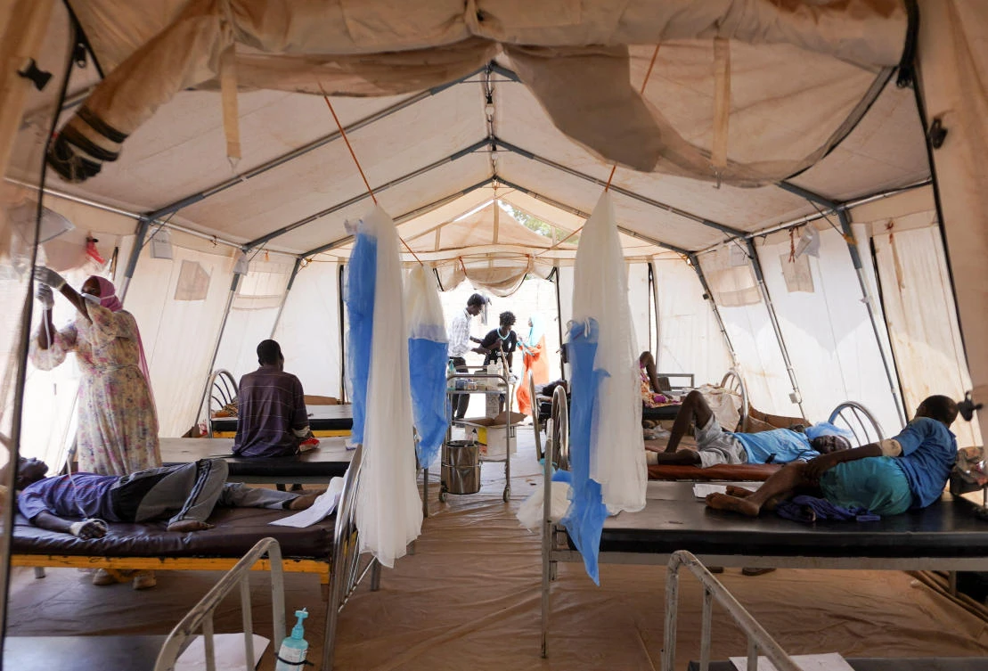 Injured displaced Sudanese people who fled violence in El-Fasher receive treatment at a makeshift clinic run by Medecins Sans Frontieres (MSF), amid ongoing clashes between the RSF and the Sudanese army, in Tawila, North Darfur. (Reurters)