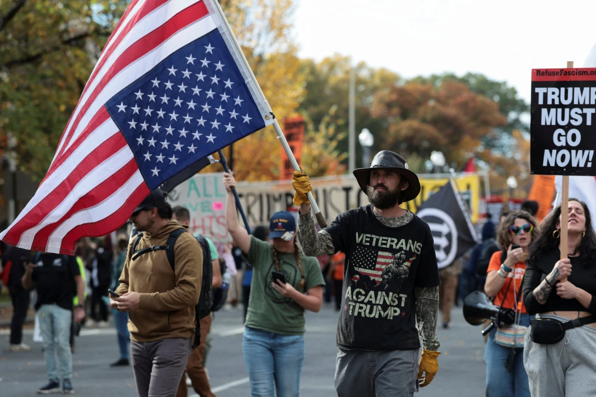 Anti-Trump demonstrators attend a protest in Washington on November 5, 2025, to mark one year since the re-election of US President Donald Trump. (REUTERS)