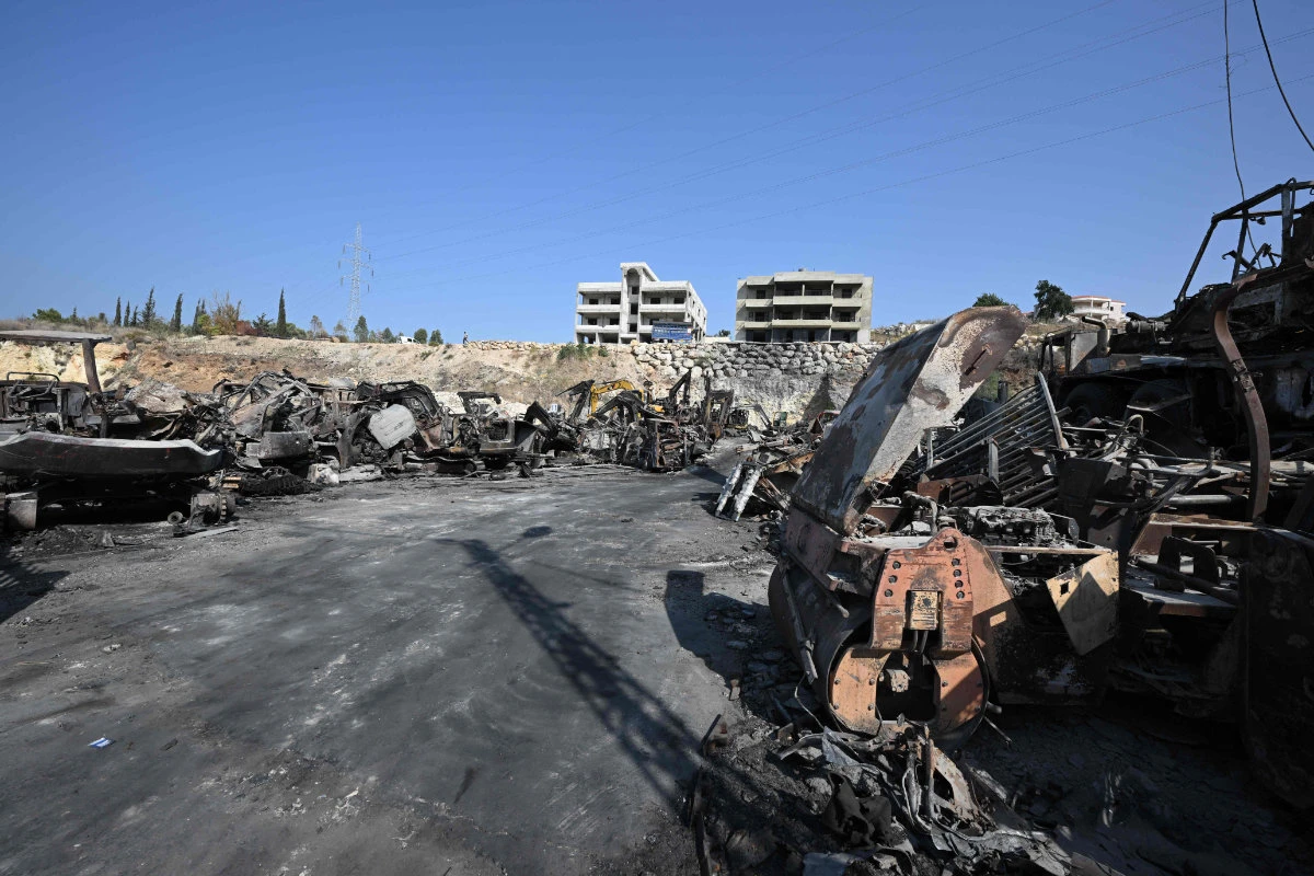 This photo taken on November 6, 2025 shows burnt construction equipment at a site targeted by an Israeli strike in Al-Msayleh area in southern Lebanon on October 11, 2025. (AFP)