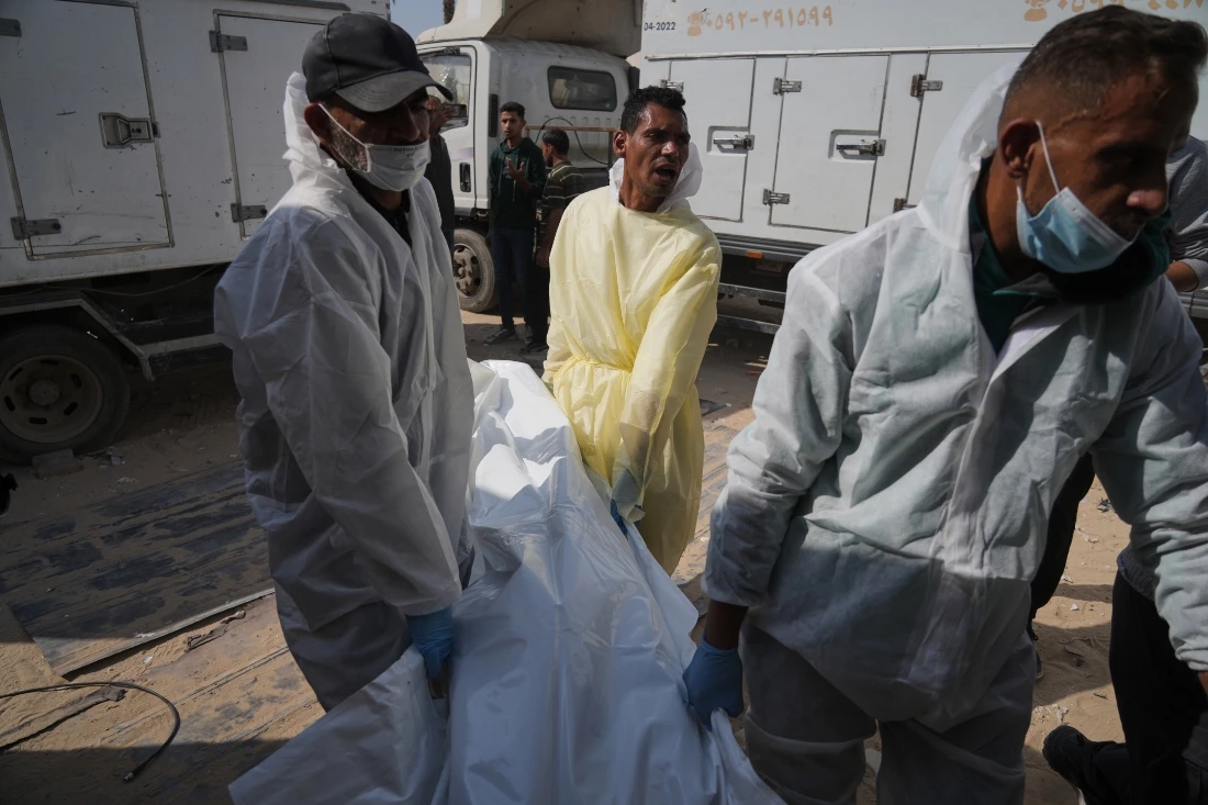 Bodies of unidentified Palestinians returned from Israel as part of the ceasefire deal are brought to Nasser Hospital in Khan Younis, Gaza Strip. (AP)