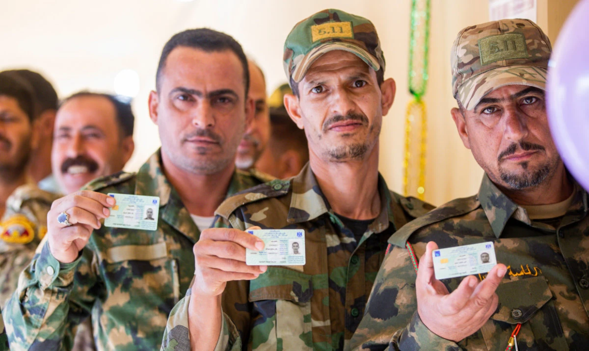 Iraqi voters weigh familiar choices as they choose a new parliament