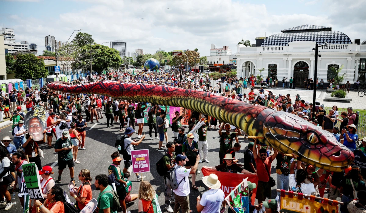 Climate protesters demand to be heard as they march on COP30 with costumes and drums
