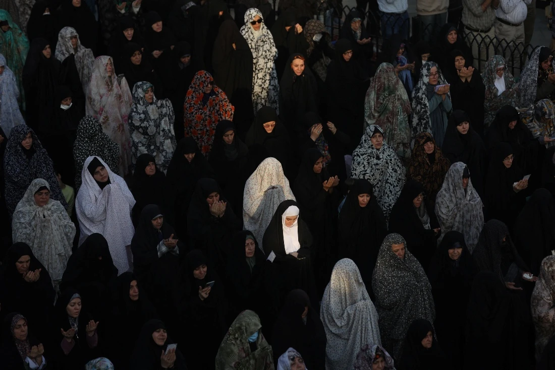 Iranian women pray for rain following a drought crisis at Imamzadeh Saleh shrine in Tehran, Iran. (WANA)