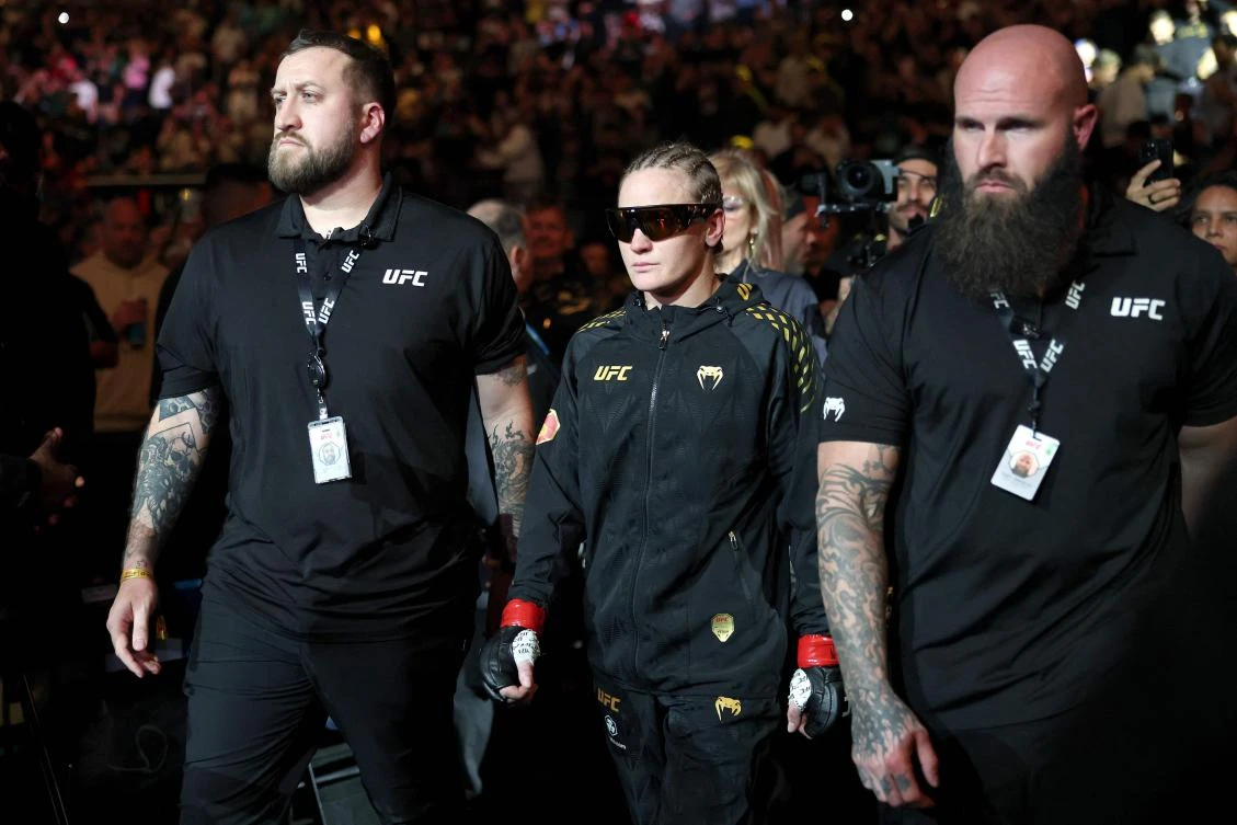 NEW YORK, NEW YORK - NOVEMBER 15: Valentina Shevchenko of Kyrgyzstan (C) walks to the octagon prior to a fight against Zhang Weili of China during UFC 322 at Madison Square Garden on November 15, 2025 in New York City. Ishika Samant/Getty Images/AFP (Photo by Ishika Samant / GETTY IMAGES NORTH AMERICA / Getty Images via AFP)