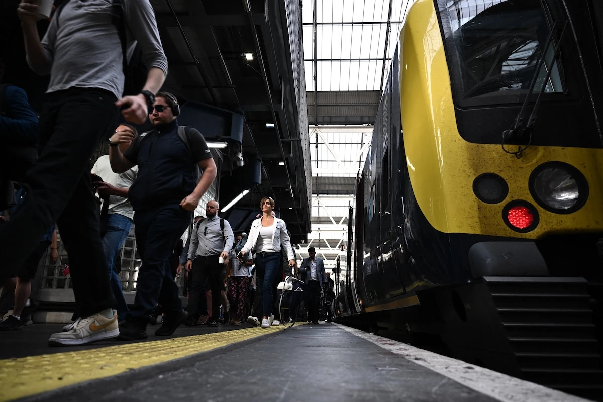 The train crew member was seriously injured while protecting passengers during a mass stabbing on a Huntingdon-bound train. (FILE/AFP)