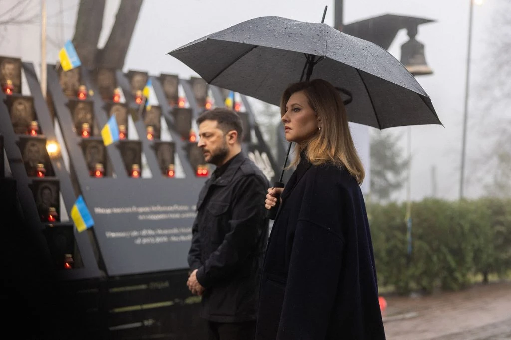 Ukraine's President Volodymyr Zelensky and First Lady Olena Zelenska paid tribute Friday to demonstrators killed during protests in 2014. Zelensky said his country is facing one of its most difficult moments in history. (AFP)