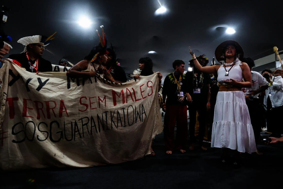 UN climate deal increases money to countries hit by climate change, but no explicit fossil fuel plan
