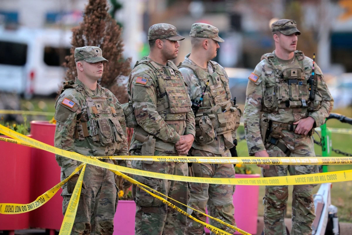 National Guard soldiers respond to a shooting near the White House in Washington, DC. (AFP)