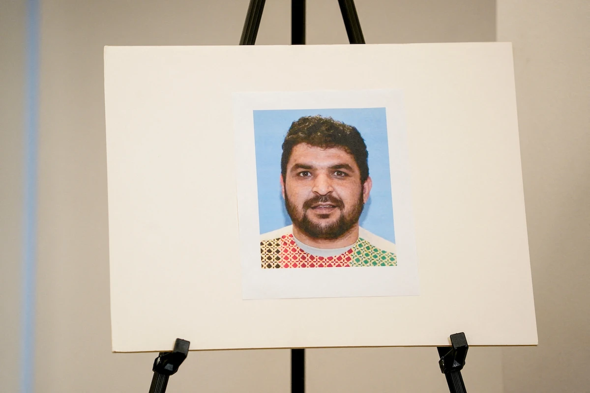 Picture of Rahmanullah Lakanwal, an Afghan national who is the suspect in the shooting of two National Guard members, is displayed at a press conference with FBI Director Kash Patel in Washington, DC, US, Nov. 27, 2025. (Reuters)