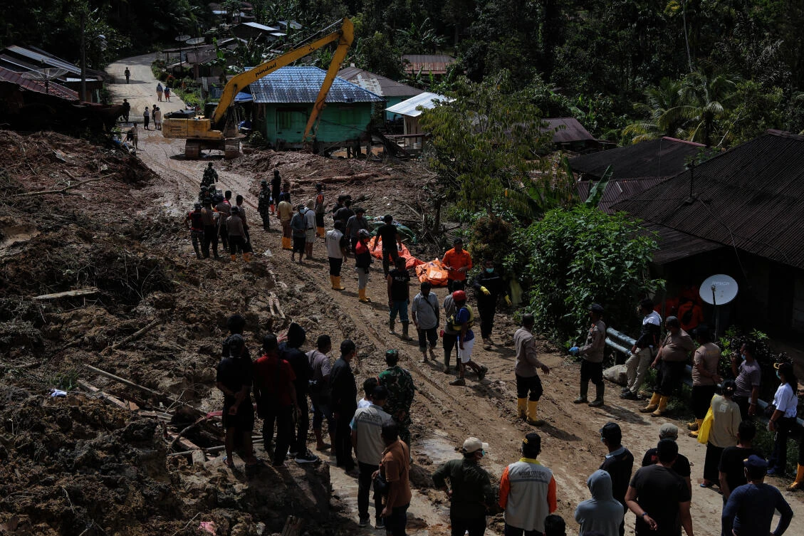 Indonesian rescuers search for survivors as the death toll from floods and landslides tops 300