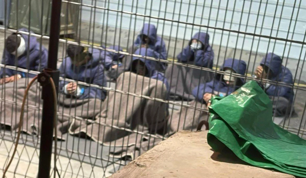 Palestinian prisoners captured in Gaza by Israeli forces at a detention facility on the Sde Teiman military base in Israel. (AP)