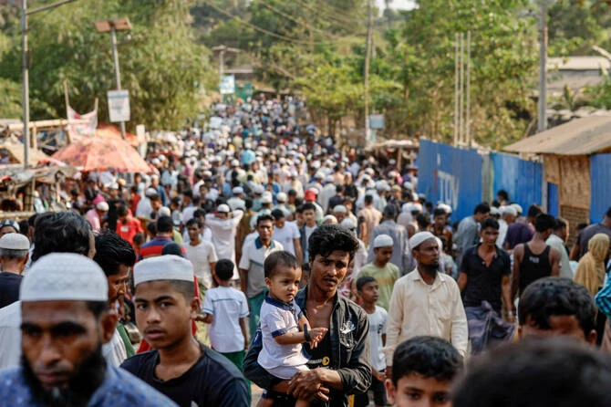 Rohingyas gather at a refugee camp kitchen market in Cox's Bazar, Bangladesh, earlier this year. (Reuters)