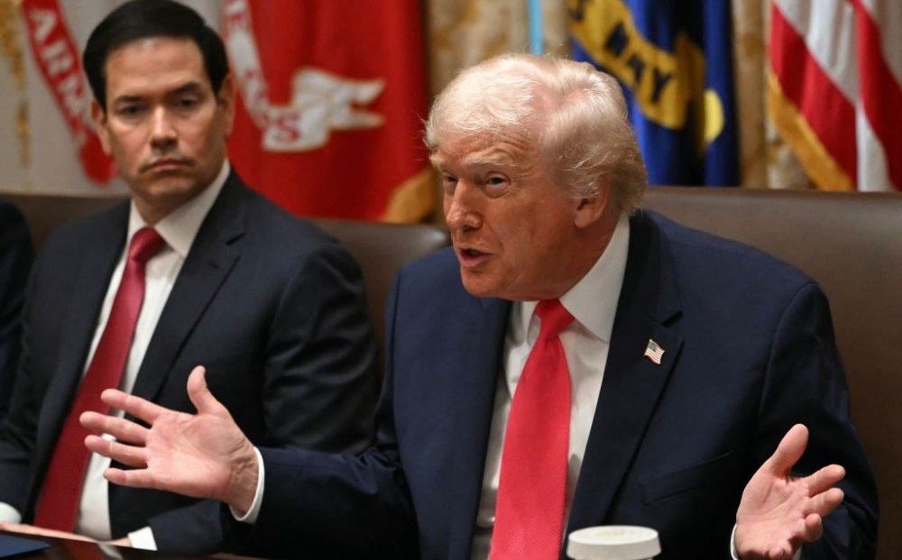 Donald Trump, alongside Marco Rubio, addresses a cabinet meeting in the White House, Washington, D.C., Dec. 2, 2025. (AFP)