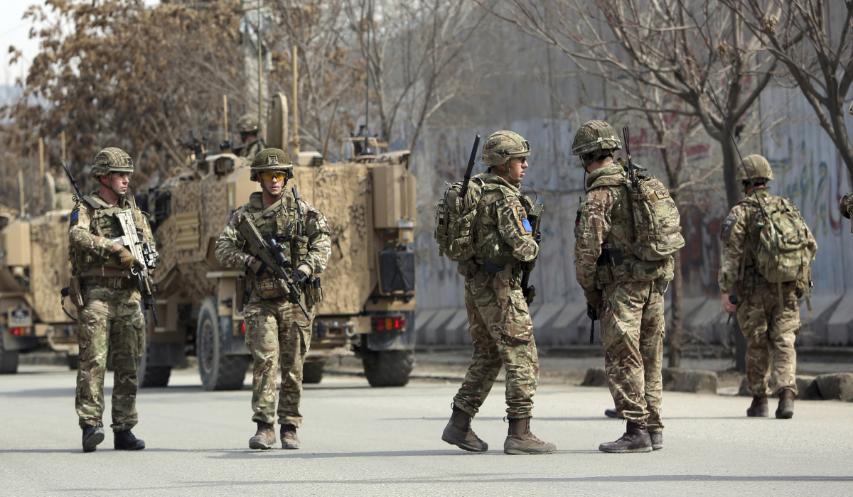 British soldiers with NATO-led Resolute Support Mission forces arrive near the site of an attack in Kabul, Afghanistan, Friday, March 6, 2020. (AP)