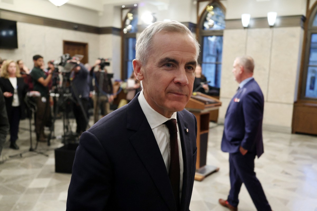 Canadian Prime Minister Mark Carney leaves after speaking with reporters about new measures to protect Canadian strategic industries in Parliament Hill, Ottawa, Ontario, Nov. 26, 2025. (AFP)
