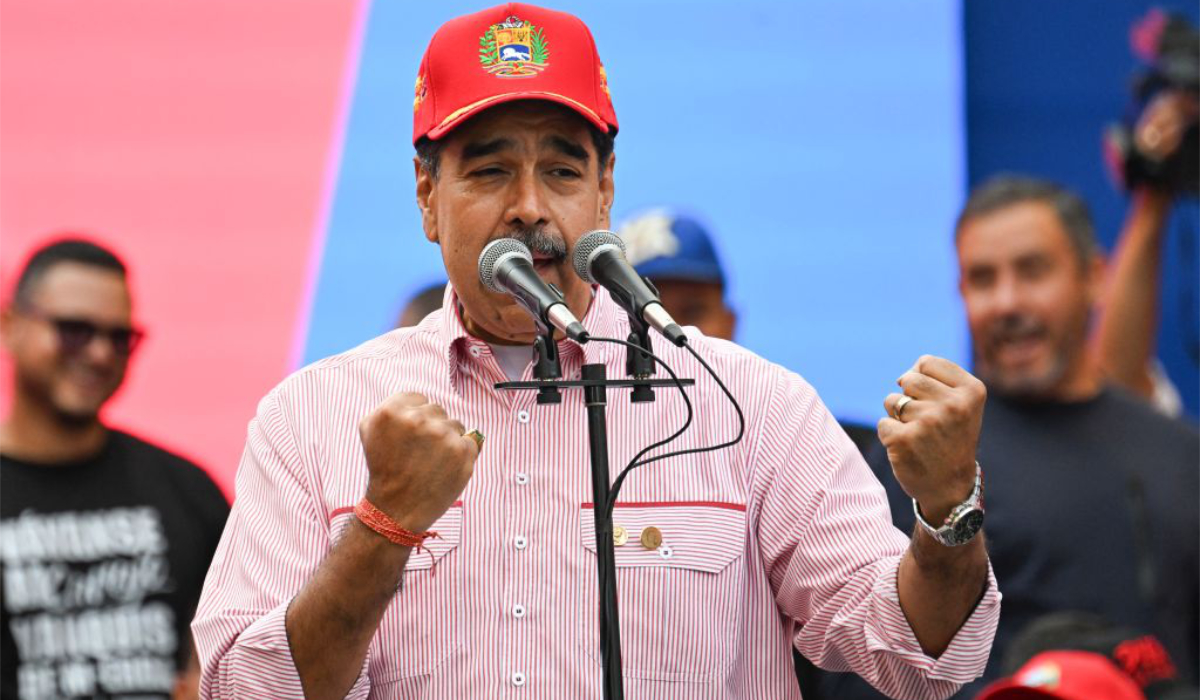 Venezuela's President Nicolas Maduro delivers a speech during a rally in Caracas on December 1, 2025. (AFP)