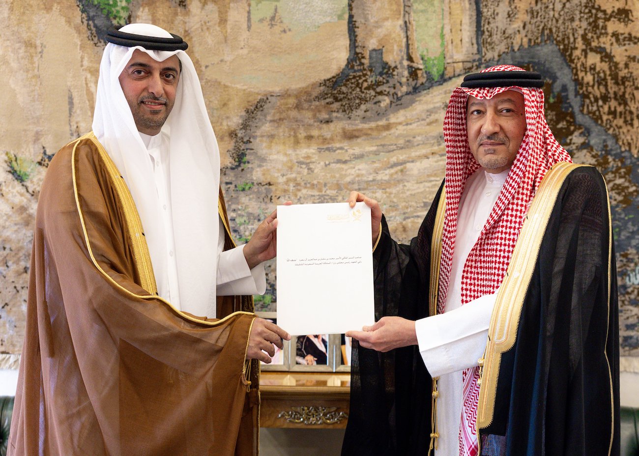 Saudi Deputy Foreign Minister Waleed bin Abdulkarim Al-Khereiji receives the letter from Qatar’s ambassador to the Kingdom Bandar bin Mohammed Al-Attiyah on Tuesday. (SPA)