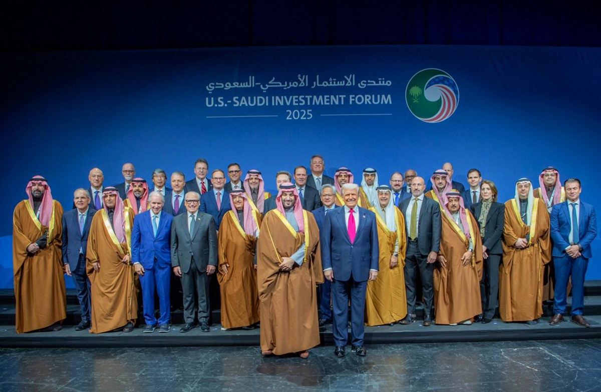 US President Donald Trump and Saudi Crown Prince Mohammed bin Salman stand with Tesla CEO Elon Musk, Nvidia CEO Jensen Huang and others at the Saudi-US Investment Forum in Washington, DC. on Nov. 19, 2025. SPA