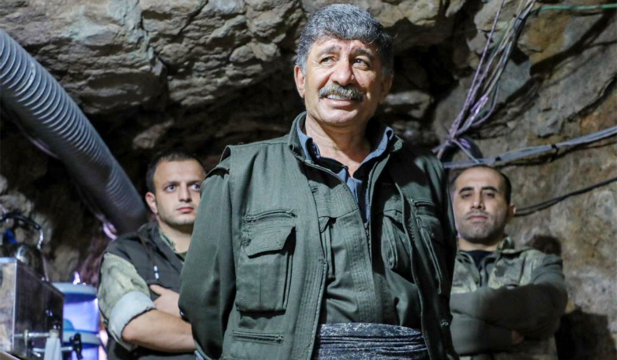 Amed Malazgirt, a senior commanders of Kurdistan Workers' Party (PKK), speaks during an interview with AFP in a cave network located in the Qandil Mountains, part of the Zagros mountain range, near the Iraqi-Iranian-Turkish borders on November 29, 2025. (AFP)