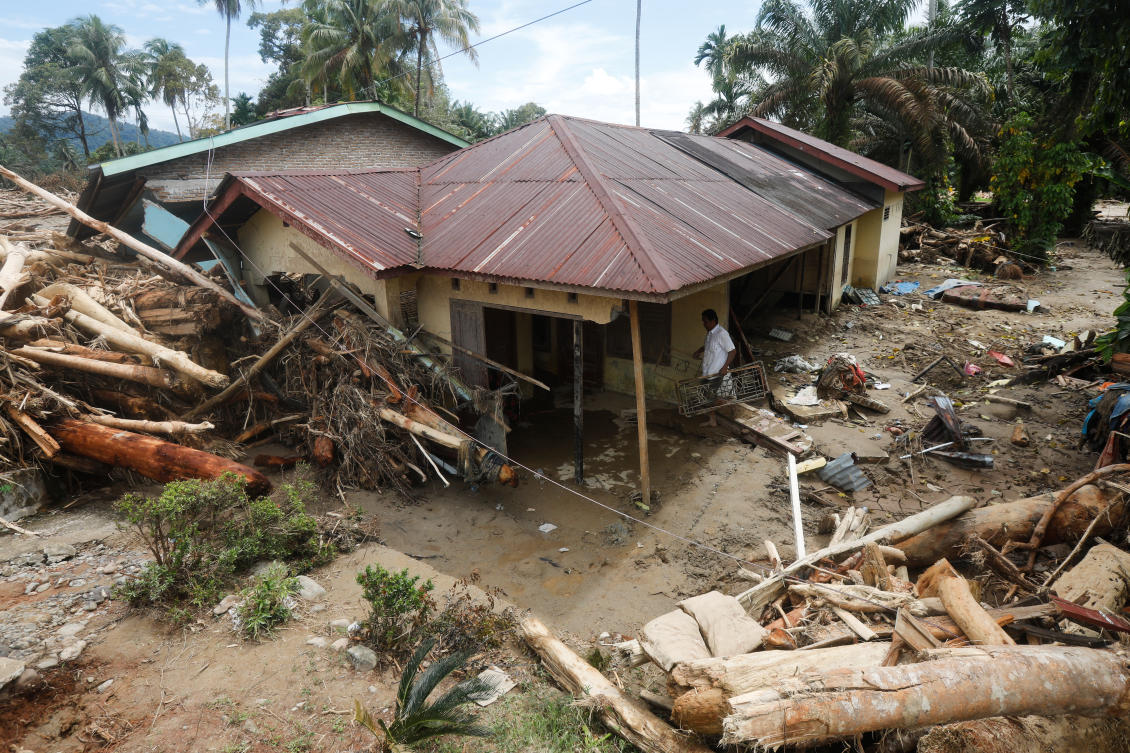 Officials in Indonesia and Sri Lanka battled Wednesday to reach survivors of deadly flooding in remote, cut-off regions as the toll in the disaster that hit four countries topped 1,300. (AP)
