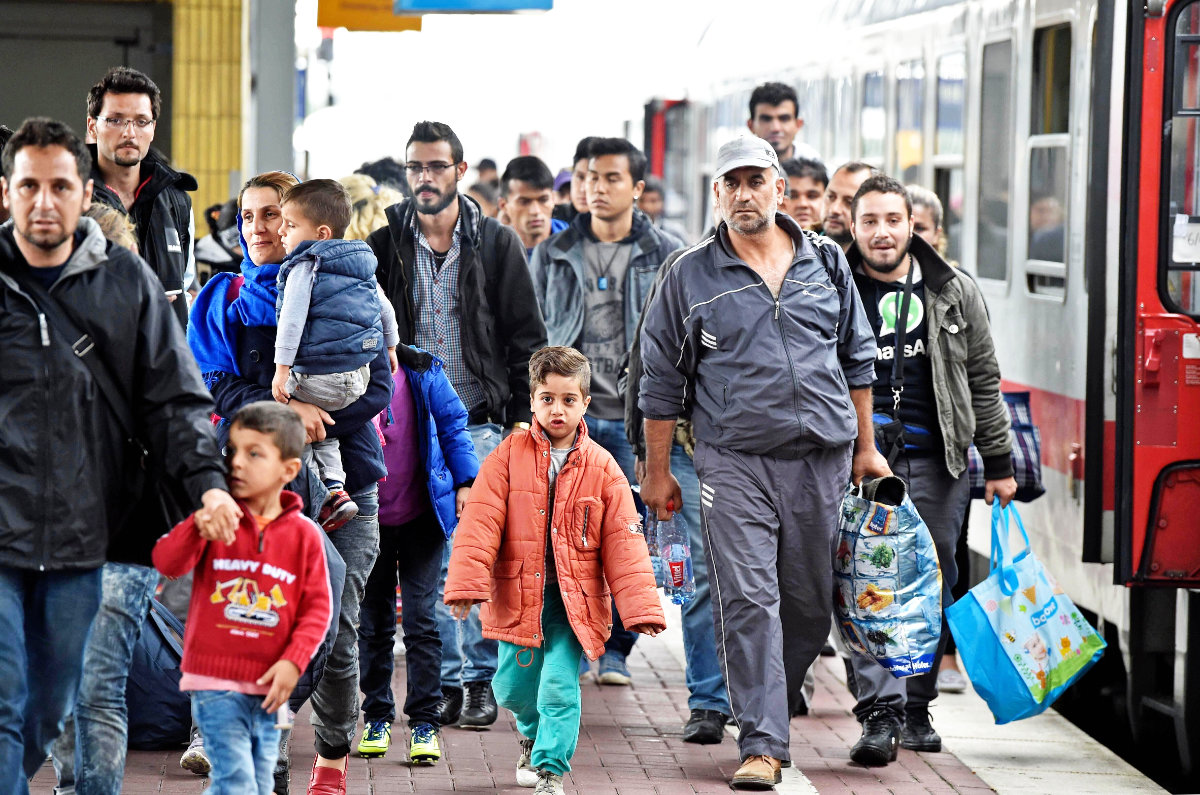 This photo taken shows refugees from Syria arriving at a train station in Dortmund, Germany, on Sept. 6, 2015, at the height of the civil war in Syria. (AP File Photo)
